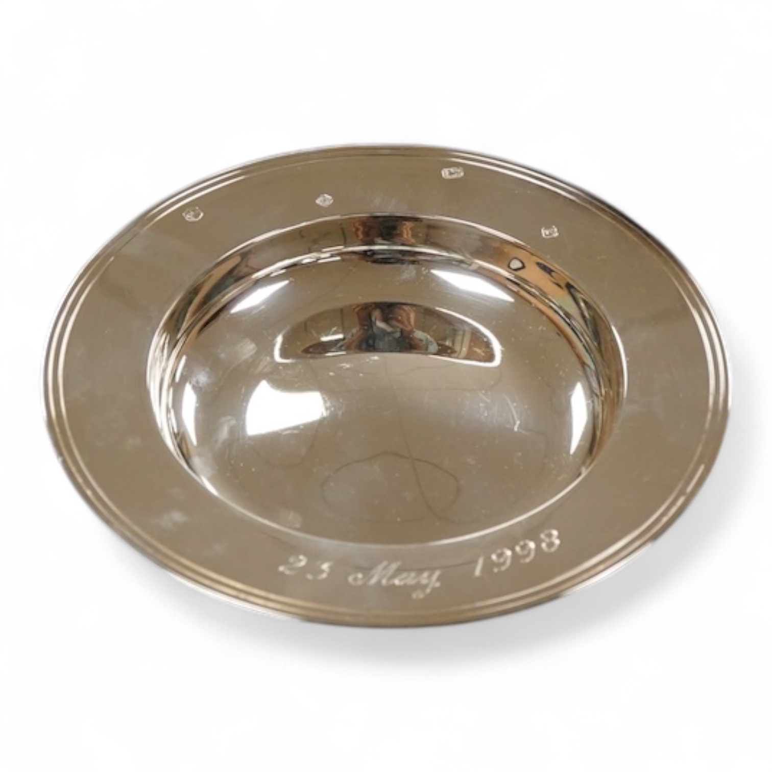 An Elizabeth II silver armada dish diameter 15cm., weight approx. 6.73ozt.